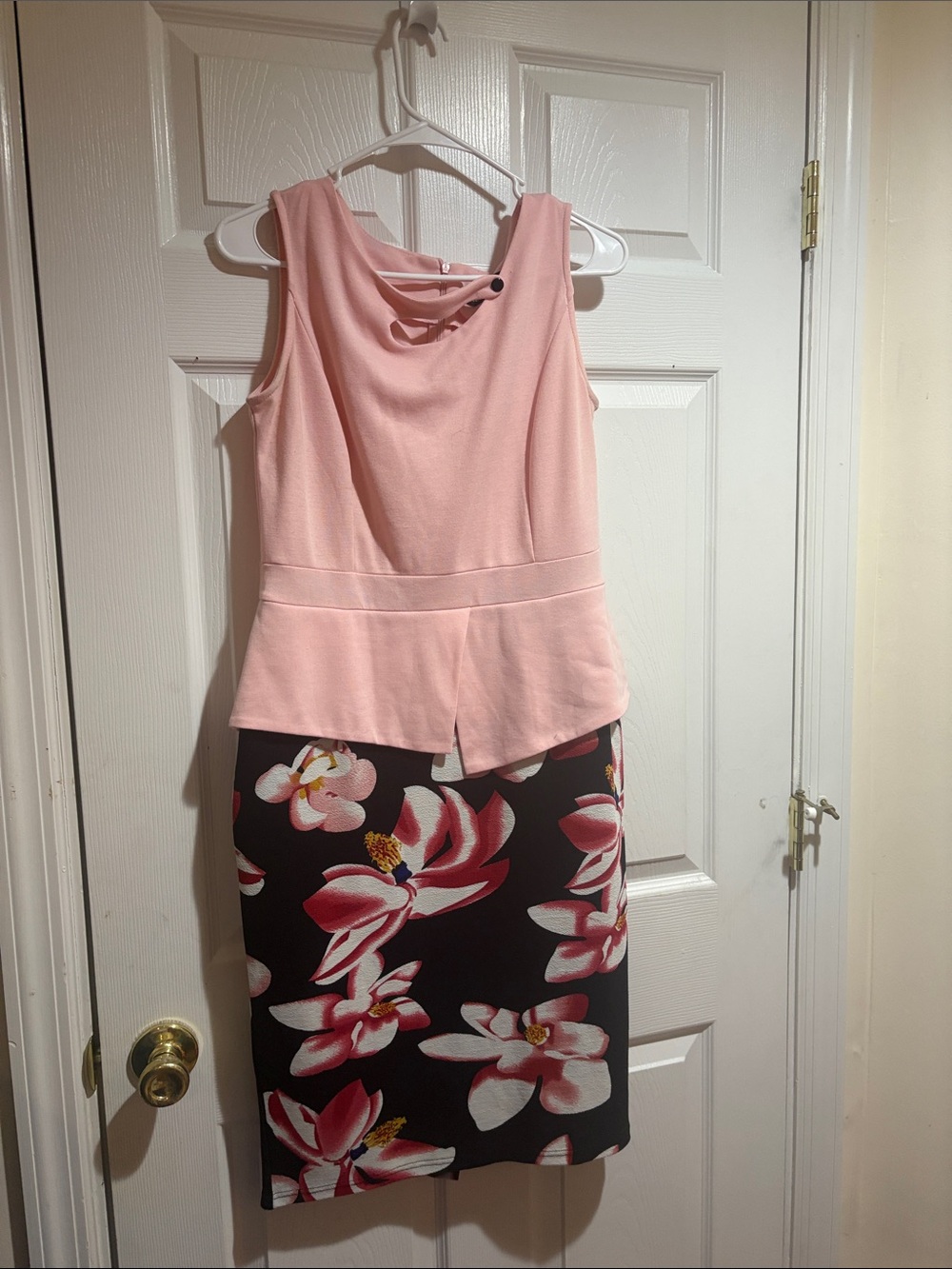 Sleeveless Pink Peplum Top with Floral Black Pencil Skirt